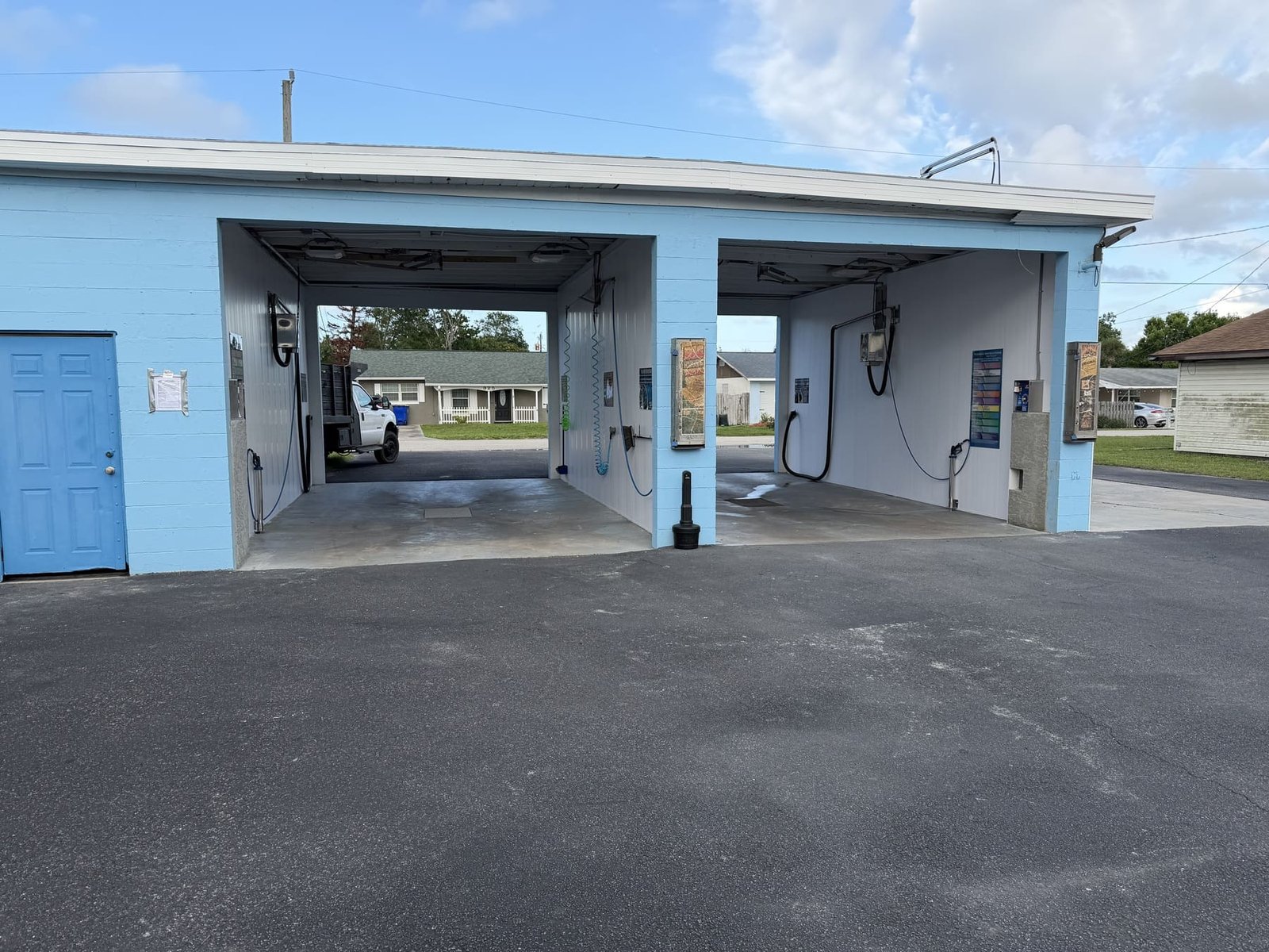 Self-service car wash bays at Ridgewood Laundry & Car Wash